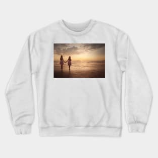 Two girl waits at sea holding hands Crewneck Sweatshirt